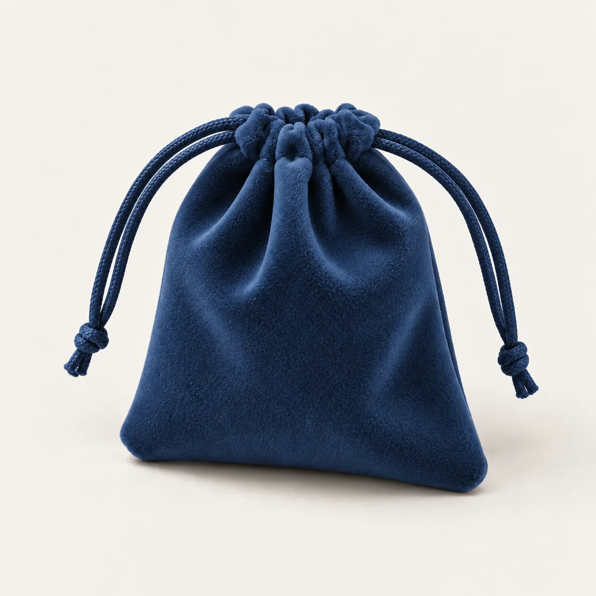 Ink Drawstring Pouch — 100 × 120 mm with visible construction and opening